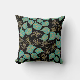 Teal green gold broad leaves pattern on black cushion