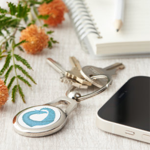 Teal heart dragon on white key ring