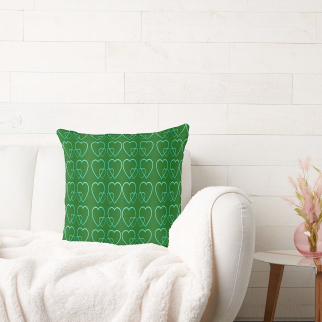 Teal hearts on green cushion (Couch)