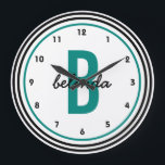 Teal Monogram Black and White Personalised Large Clock<br><div class="desc">A bold,  modern,  personalised custom wall clock for men or women. Bold black and teal circles  highlight a jumbo sized teal coloured monogram and casual handwriting font first name in black. Other colours,  styles and designs available in the Party Hearty store.</div>