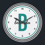 Teal Monogram Black and White Personalised Large Clock<br><div class="desc">A bold,  modern,  personalised custom wall clock for men or women. Bold black and teal circles  highlight a jumbo sized teal coloured monogram and casual handwriting font first name in black. Other colours,  styles and designs available in the Party Hearty store.</div>