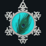 Teal Peacock Feather Snowflake Pewter Christmas Ornament<br><div class="desc">A peacock feather with the teal tones brought out on a teal background.</div>