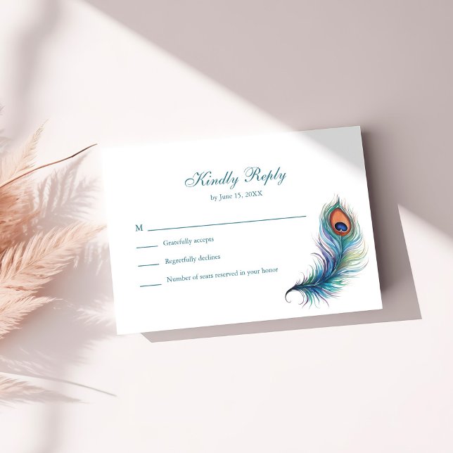Teal Peacock Feather Wedding RSVP Card (Teal Peacock Feather Wedding RSVP Card on a white table.)