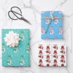 Teal, Pink, Blue Snowman Christmas Wrapping Paper Sheet<br><div class="desc">Cute little whimsical hand drawn cartoon snowmen in pink,  blue,  white and red and green Christmas wrap.</div>