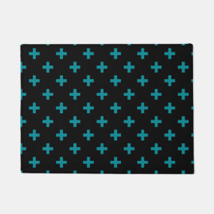 Teal polka crosses on black doormat