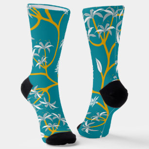 Teal socks with a bold yellow vine pattern