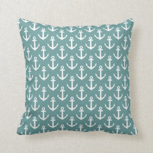 Teal throw pillow with nautical anchor pattern
