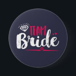 Team Bride Bachelorette Party Wedding Button<br><div class="desc">Team bride button. Perfect for bridal shower and bachelorette party accessories before the wedding. Navy blue,  white and pink with diamond and small hearts. Background colour can be customised to your desired colour theme. This pin is for the bridesmaid,  maid of honour,  bride's families and friends.</div>