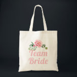 Team Bride Bridesmaid Romantic Pink Rose Floral Tote Bag<br><div class="desc">================= ABOUT THIS DESIGN ================= Modern Pink Floral Wrapping Invitation Suite. (1) All text style, colours, sizes can be modified to fit your needs. (2) If you need any customisation or matching items, please feel free to contact me. (In case you didn't get my response, please check the email SPAM...</div>