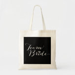 Team Bride Script Diamond Bridal Party Wedding Bag<br><div class="desc">Designed by fat*fa*tin. Easy to customise with your own text,  photo or image. For custom requests,  please contact fat*fa*tin directly. Custom charges apply.

www.zazzle.com/fat_fa_tin
www.zazzle.com/color_therapy
www.zazzle.com/fatfatin_blue_knot
www.zazzle.com/fatfatin_red_knot
www.zazzle.com/fatfatin_mini_me
www.zazzle.com/fatfatin_box
www.zazzle.com/fatfatin_design
www.zazzle.com/fatfatin_ink</div>