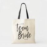 Team Bride | Script Style Custom Wedding Tote Bag<br><div class="desc">Make the guest of the Bride feel extra appreciated with this special custom name canvas style tote bag.

It features the words "Team Bride" in an elegant script style text. Underneath this is a spot for her name or initials.</div>