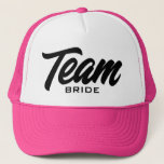 Team Bride script typography wedding party Trucker Hat<br><div class="desc">Team Bride script typography wedding party Trucker Hat. Custom pink baseball cap for bride and bridesmaids. Stylish hand lettering design for bachelorette party games and more. Available in other cool colours too. Create them for your group of friends, guests, entourage, squad, crew, tribe, maid of honour, family members etc. Also...</div>