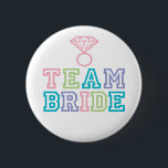 Team Bride with Diamond Ring 6 Cm Round Badge<br><div class="desc">Fun Team Bride buttons to wear the day of the Bridal Shower,  Bachelorette Party,  Rehearsal Dinner and/or Wedding Day. Colourful lettering in Pink,  Teal,  Lime and Purple. For enquiries about custom design changes by the independant designer please email paula@labellarue.com BEFORE you customise or place an order.</div>