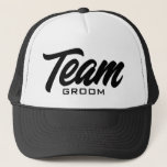 Team Groom script typography wedding party Trucker Hat<br><div class="desc">Team Groom script typography wedding party Trucker Hat. Custom black and white baseball cap for groom and groomsmen. Stylish hand lettering design for bachelor party games and more. Available in other cool colours too. Create them for your group of friends, guests, squad, crew, best man etc. Also available for bridal...</div>