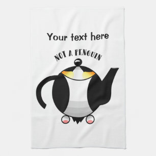Teapot that looks like a penguin tea towel