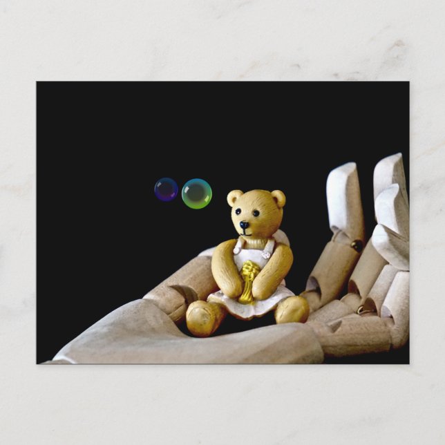 Teddy Bear in the Hand Watching Bubbles Postcard (Front)