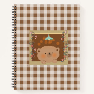 Teddy bear looking out of a window notebook