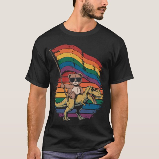 Teddy bear riding dinosaur waving rainbow flag T-Shirt (Front)
