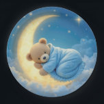 Teddy Bear Sleeping on a Moon Paper Plate<br><div class="desc">A cute teddy bear is cosily wrapped in a blue blanket,  resting peacefully on a glowing crescent moon in a dreamy night sky.
Can be used for a baby shower.</div>