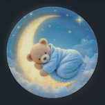 Teddy Bear Sleeping on a Moon Paper Plate<br><div class="desc">A cute teddy bear is cosily wrapped in a blue blanket,  resting peacefully on a glowing crescent moon in a dreamy night sky.
Can be used for a baby shower.</div>
