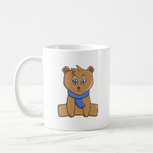 Teddy bear wearing a blue scarf coffee mug