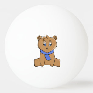 Teddy bear wearing a blue scarf ping pong ball