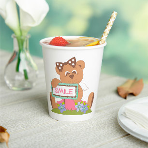 Teddy Bear with Bow Holding Smile Sign  Paper Cups