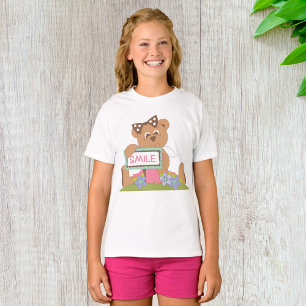Teddy Bear with Bow Holding Smile Sign T-Shirt