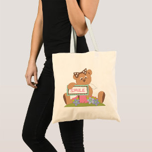 Teddy Bear with Bow Holding Smile Sign Tote Bag