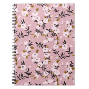 Tender spring cherry blossom on pink notebook