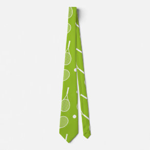 Tennis ball and racket  on green tie