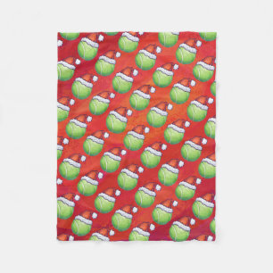 Tennis Ball in Santa Hat Pattern on Red Fleece Blanket