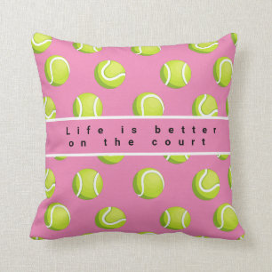 Tennis ball life is better on the court on pink   cushion