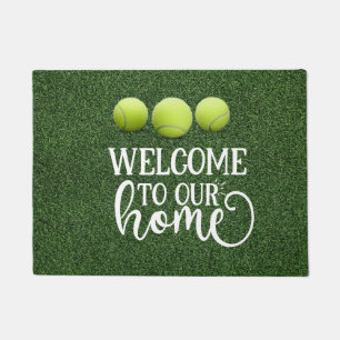 Tennis ball on the court welcome to our home doormat