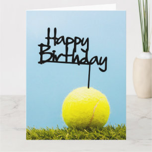 Tennis ball with Happy Birthday Sign on blue sky   Card
