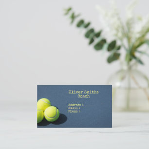 Tennis balls are on the court background business card