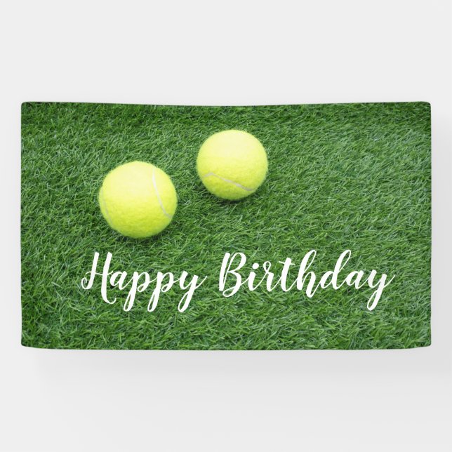 Tennis balls on green grass banner (Horizontal)