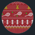 Tennis Christmas Sweater Knitted Pattern Red Xmas  Classic Round Sticker<br><div class="desc">Warm and cosy winter days and nights illustration design, featuring classic knitted funny ugly Christmas sweater with tennis rackets and green tennis balls, jingle bells, fir trees, and snowflakes. Minimalistic Xmas sweater pattern festive design in light blue and white for tennis players. Tennis Christmas pattern sweater. Tennis Xmas design. Scandi...</div>