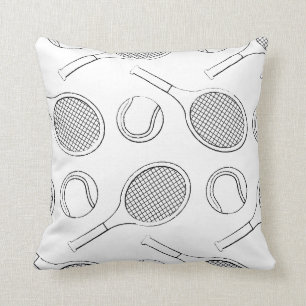 Tennis racket and ball black in on white cushion