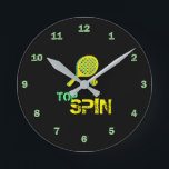 Tennis Sport Pop Art, Green & Yellow Racket & Ball Round Clock<br><div class="desc">Retro, pop, colourful creation of Tennis Racket silhouette, Round Clock.
Special theme of Green & Yellow colouring, with simple but elegant icon styled art.
Original digital art by Raphael Studio - 'Tennis'.
Retro pop & style, unique design.</div>