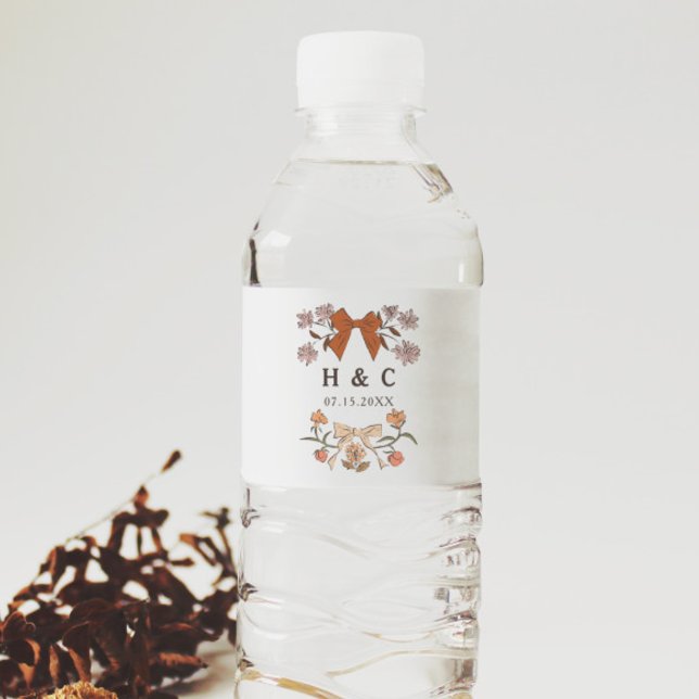Terracotta Bows Blossom Wedding Monogram Water Bottle Label (Creator Uploaded)