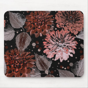 Terracotta flowers with grey leaves on a black  mouse mat