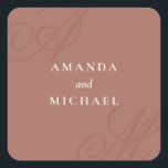 Terracotta Modern Edge Elegant Monogram Wedding Square Sticker<br><div class="desc">A simple modern minimalist design with an elegant edge, this unique sticker design features beautiful calligraphy script monograms of the bride and groom on alternate corners. The bride and groom's names are centred with a clean classic look on an earthy terracotta background with ivory text. Replace the sample text with...</div>