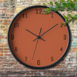 Terracotta Orange Solid Colour Warm & Earthy Desig Clock<br><div class="desc">The Terracotta Orange Solid Colour pattern is a timeless and versatile design that radiates warmth and natural elegance. This rich, earthy shade of orange adds a sense of cosiness and sophistication to any project, making it a perfect choice for fashion, home decor, textiles, and graphic design. Its deep, muted tone...</div>