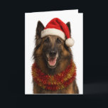 Tervuren in a Santa hat Christmas card<br><div class="desc">One very regal looking Tervuren Belgian Shepherd sporting a Santa hat,  adorned in tinsel and looking very happy that it's Christmas!

Why not wish a lucky someone a Happy Christmas with this Tervuren Christmas card.

You can personalise the text to your heart's content!

Also available as an instant download.</div>