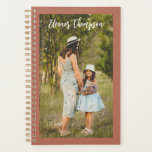 Text Overlay Name Terracotta Personalized Photo Planner<br><div class="desc">Capture your favorite memory on the cover of this personalized undated planner featuring a full photo layout framed in warm terracotta. Customize with your name for a timeless, minimalist design that keeps you inspired all year long. Perfect for moms, students, or professionals who love organization with a personal touch. Makes...</div>