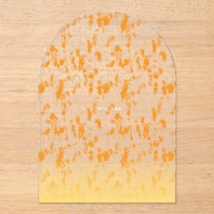 Textile pattern featuring a vibrant orange and gol acrylic invitations