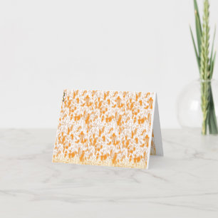 Textile pattern featuring a vibrant orange and gol card