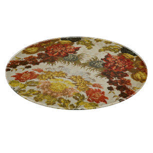 Textile with a repeating floral pattern cutting board