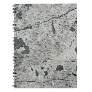 Texture of an old cracked concrete wall. Backgroun Notebook